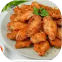 Plate of crispy fried chicken wings.