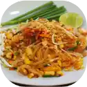 Pad Thai with lime and green onions.