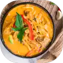 Spicy Thai curry with vegetables and herbs.