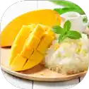 Mango with sticky rice and mint garnish.