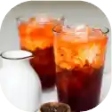 Iced tea glasses with milk and ice.