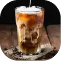Iced coffee with milk on wooden table.
